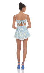 Blue Floral Ruffle Romper in White